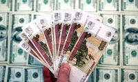 Рубль вырос до максимума за 10 дней